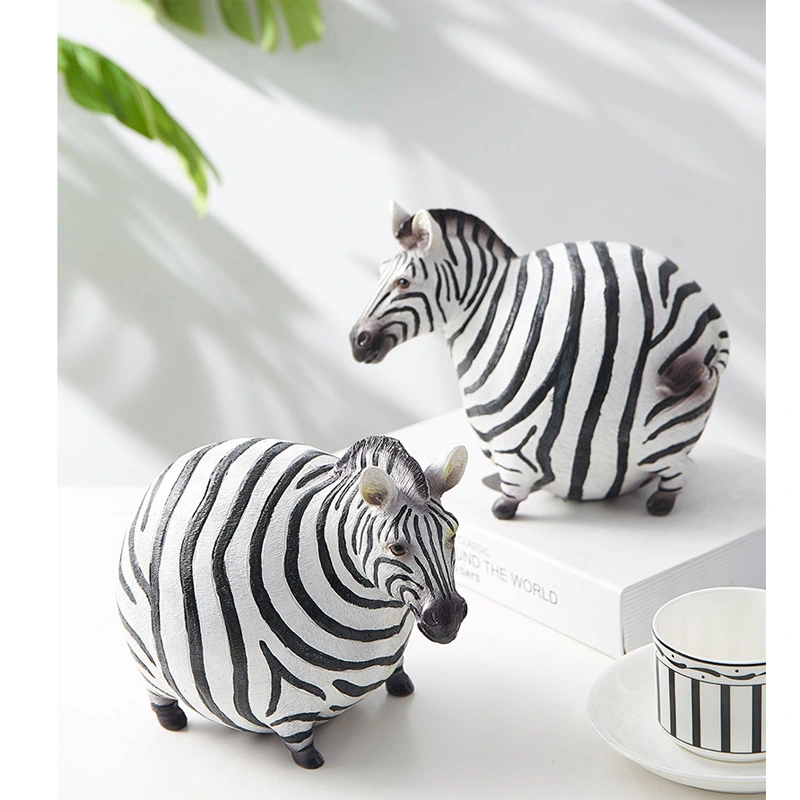 3210180 Paar niedliche mollige Zebra-Statue